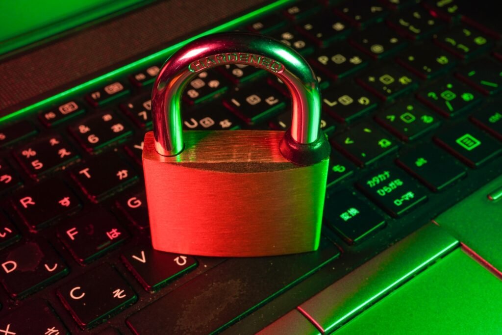 A padlock on a laptop keyboard representing secure encrypted file transfer for accounting clients.